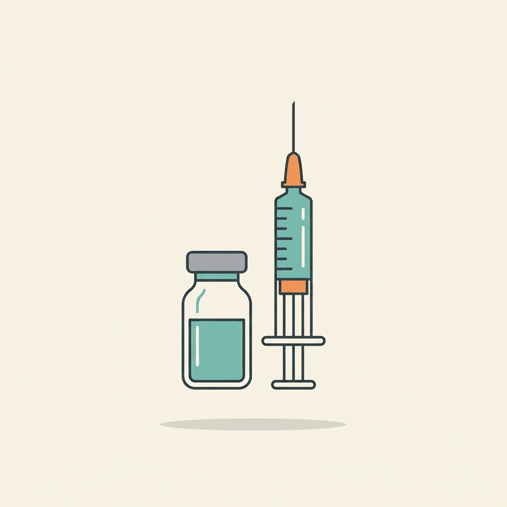 A glass vial beside a syringe drawing a fresh dose